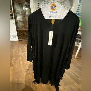 This is a NWT WRANGLER DRESS WITH FRINGE ON THE SIDES.